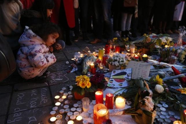 people gather at the place de la bourse to pay tribute to the victims of tuesday 039 s bomb attacks in brussels belgium march 25 2016 photo reuters