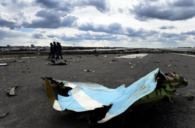 russian emergency ministry rescuers examine the wreckage of the crashed plane at rostov on don airport on march 20 2016 photo reuters russian emergency ministry rescuers examine the wreckage of the crashed plane at rostov on don airport on march 20 2016 photo reuters