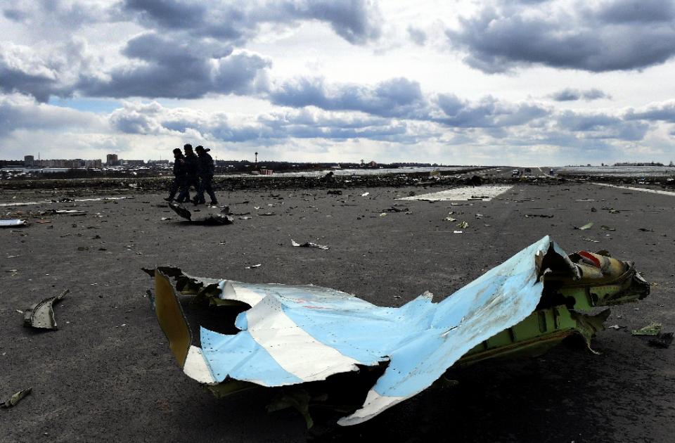 russian emergency ministry rescuers examine the wreckage of the crashed plane at rostov on don airport on march 20 2016 photo reuters