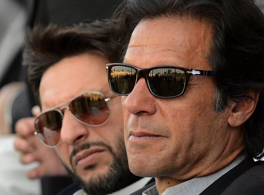 pti chief and former pakistan skipper imran khan r and pakistan t20i captain shahid afridi l photo afp pti chief and former pakistan skipper imran khan r and pakistan t20i captain shahid afridi l photo afp