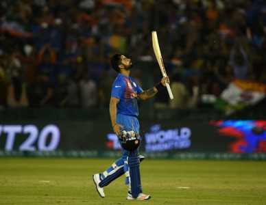 masterful kohli carries india to world t20 semis