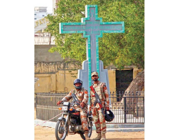 rangers personnel deployed before a crucifix near a church in saddar photo online rangers personnel deployed before a crucifix near a church in saddar photo online