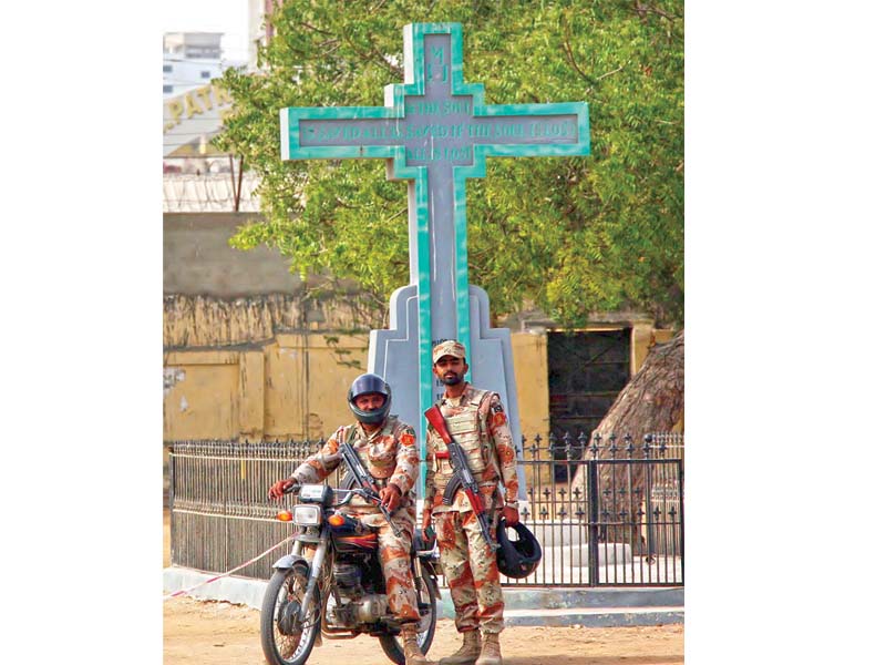 rangers personnel deployed before a crucifix near a church in saddar photo online