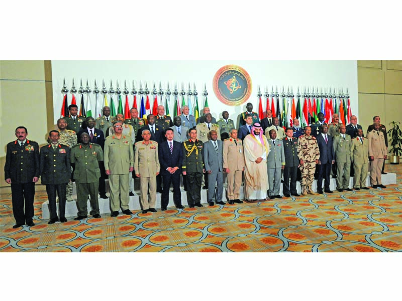 military leaders from member states of saudi led counter terrorism coalition pose for a picture during a meeting in the capital riyadh on sunday photo afp