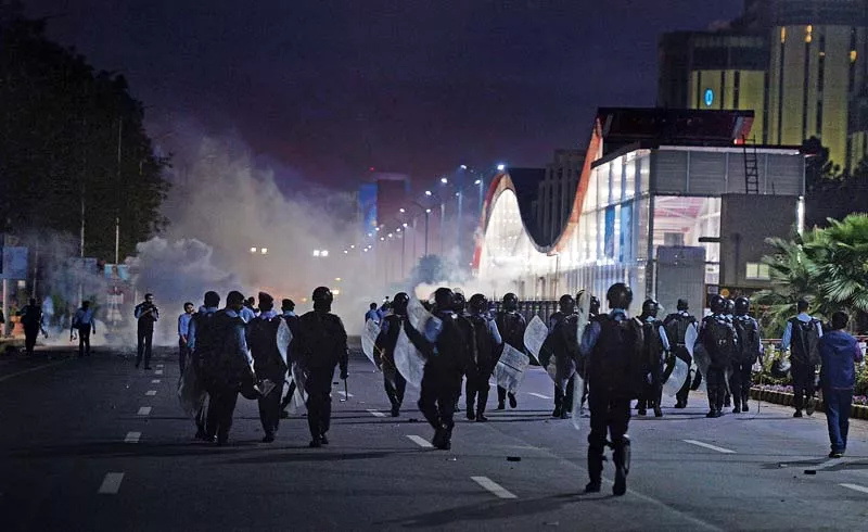 riot police confronts protesters near the metro station in islamabad photo afp riot police confronts protesters near the metro station in islamabad photo afp