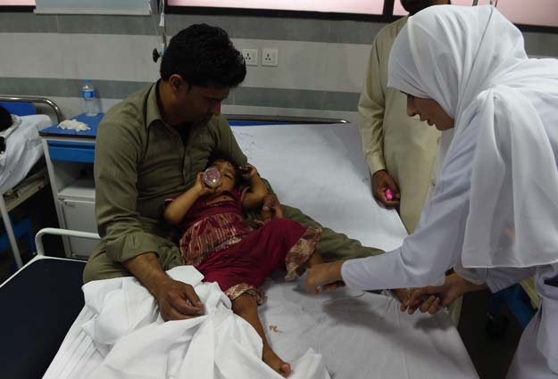 an injured pakistani child victim of a suicide blast rests in a hospital in lahore on march 28 2016 photo afp