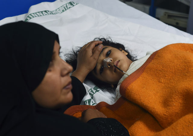 an injured child victim of a suicide blast rests in a hospital in lahore on march 28 2016 photo afp
