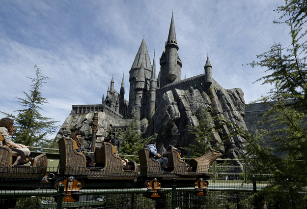 guests take a ride on a rollercoaster outside the hogwarts school during a soft opening and media tour of quot the wizarding world of harry potter quot theme park at the universal studios hollywood in los angeles california on march 22 2016 photo reuters