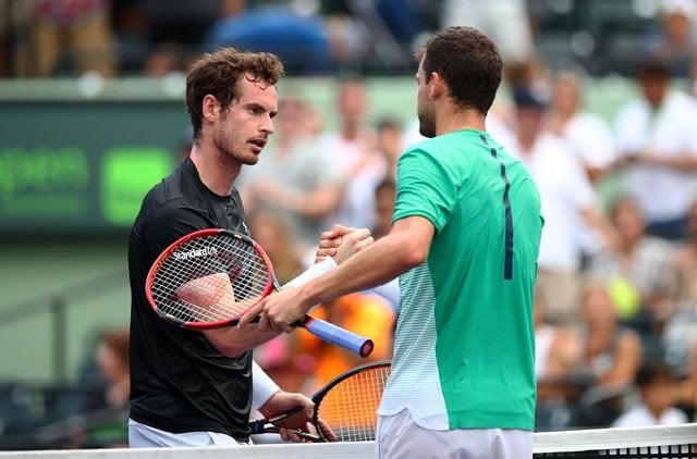 grigor dimitrov shakes hands at the net after his three set victory against andy murray in their miami open match at crandon park tennis center on march 28 2016 in key biscayne florida photo afp grigor dimitrov shakes hands at the net after his three set victory against andy murray in their miami open match at crandon park tennis center on march 28 2016 in key biscayne florida photo afp