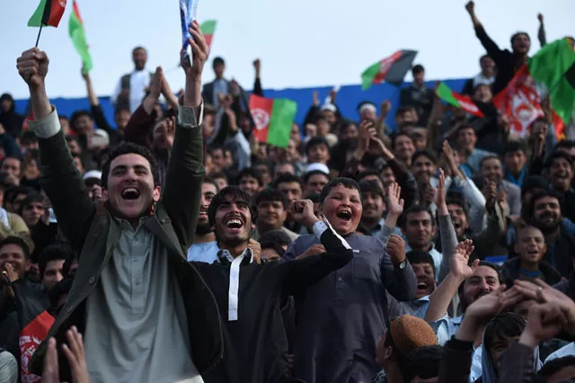 afghan cricket fans cheer and wave the national flag as they welcome the country 039 s cricket team home at the cricket board stadium in kabul on march 29 2016 photo afp afghan cricket fans cheer and wave the national flag as they welcome the country 039 s cricket team home at the cricket board stadium in kabul on march 29 2016 photo afp