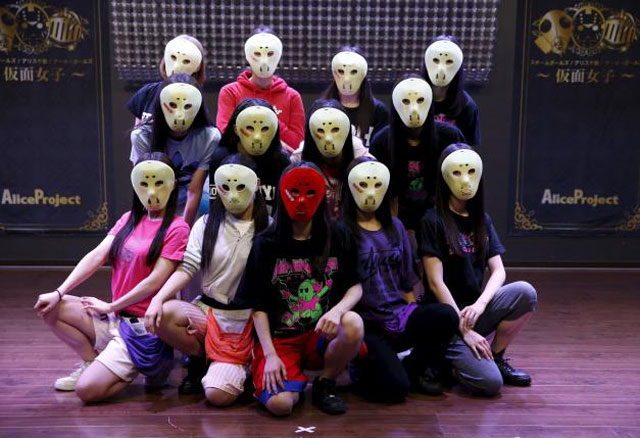 the masks enhance the band 039 s appeal photo reuters