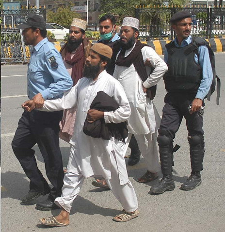 police walk off three protesters photo waseem nazir express police walk off three protesters photo waseem nazir express