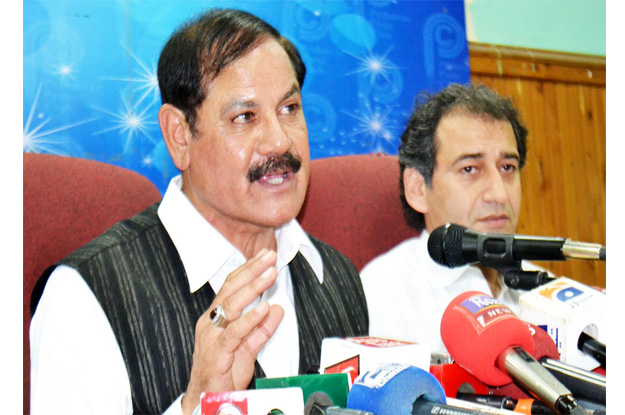 special assistant to cm on information mushtaq ghani addressing a news conference at peshawar press club on wednesday photo online