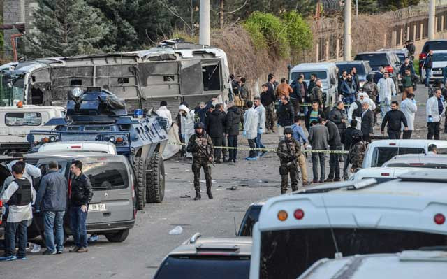 turkish special force police officers walk at the site of a bomb attack in diyarbakir southeastern turkey on march 31 2016 photo afp turkish special force police officers walk at the site of a bomb attack in diyarbakir southeastern turkey on march 31 2016 photo afp
