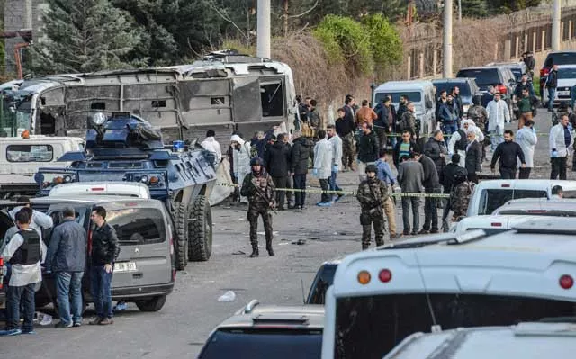 turkish special force police officers walk at the site of a bomb attack in diyarbakir southeastern turkey on march 31 2016 photo afp turkish special force police officers walk at the site of a bomb attack in diyarbakir southeastern turkey on march 31 2016 photo afp