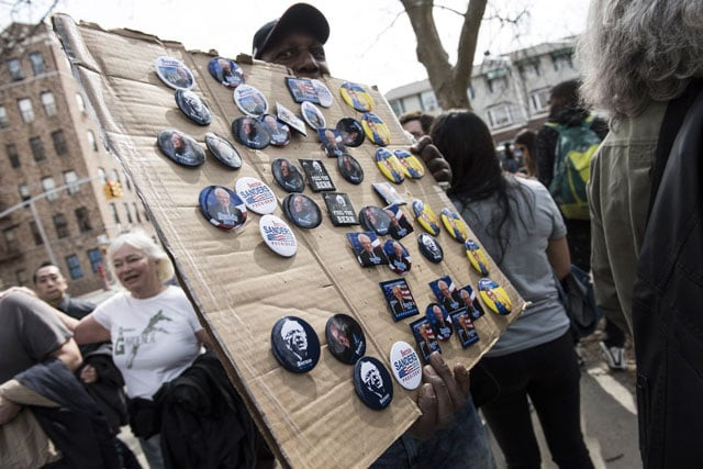 a man sells political buttons prior to a rally for democratic presidential candidate senator bernie sanders at st mary 039 s park on march 31 2016 in the bronx borough of new york city photo afp a man sells political buttons prior to a rally for democratic presidential candidate senator bernie sanders at st mary 039 s park on march 31 2016 in the bronx borough of new york city photo afp