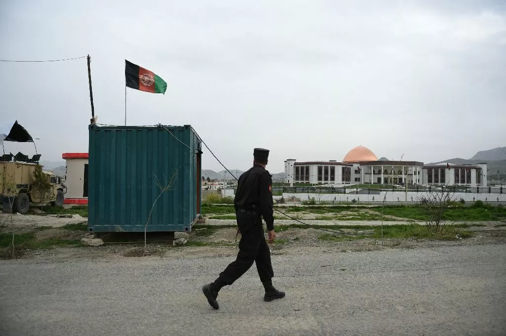 an afghan policeman walks in front of the newly built parliament complex in kabul on march 28 2016 after taliban insurgents fired a barrage of rockets at the complex photo afp an afghan policeman walks in front of the newly built parliament complex in kabul on march 28 2016 after taliban insurgents fired a barrage of rockets at the complex photo afp