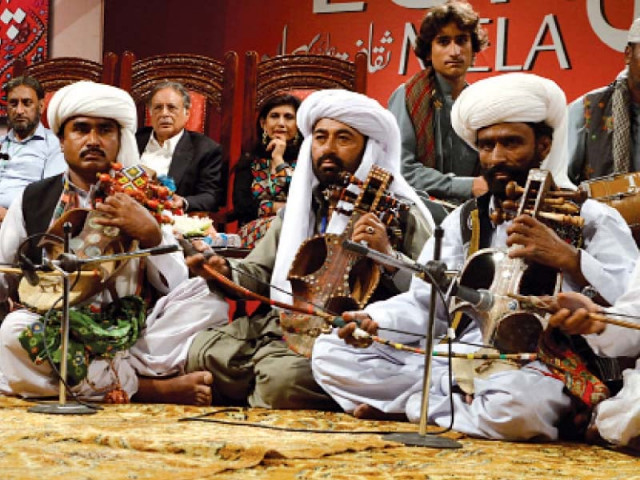 artisans perform at the lok mela photo mudassar raja express