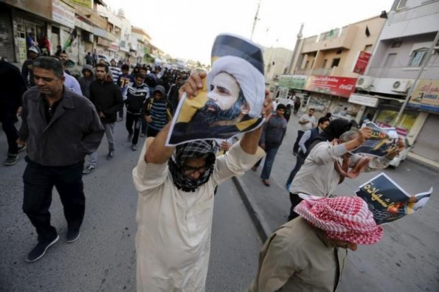 protesters holding poster of saudi shi 039 ite cleric nimr al nimr protest against his execution by saudi authorities in the village of sanabis west of manama bahrain january 3 2016 photo reuters protesters holding poster of saudi shi 039 ite cleric nimr al nimr protest against his execution by saudi authorities in the village of sanabis west of manama bahrain january 3 2016 photo reuters