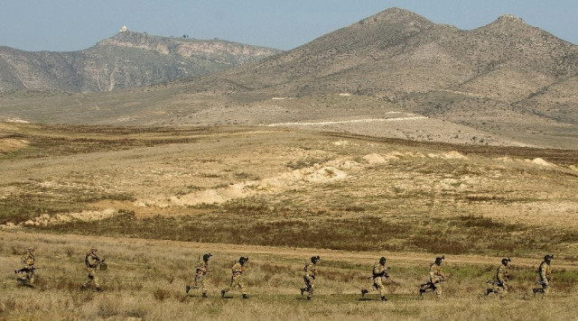armenian and karabakh armed forces hold joint military exercises near the town of tigranakert in november 2014 photo afp armenian and karabakh armed forces hold joint military exercises near the town of tigranakert in november 2014 photo afp