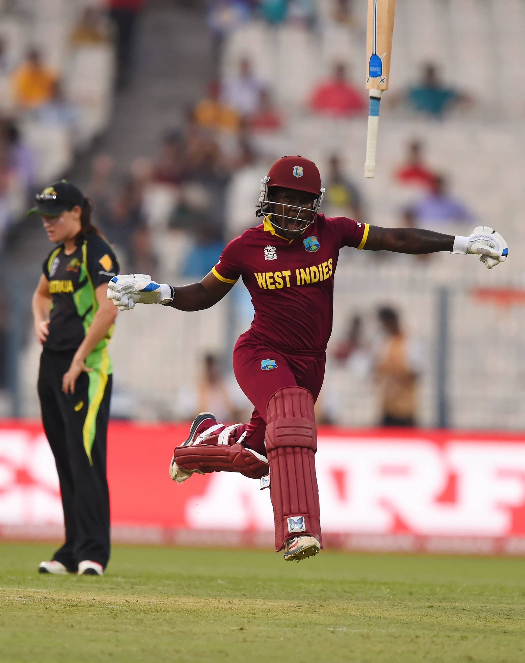 west indies 039 s deandra dottin celebrates after victory in the world t20 cricket tournament women 039 s final match between australia and west indies at the eden gardens cricket stadium in kolkata on april 3 2016 photo afp