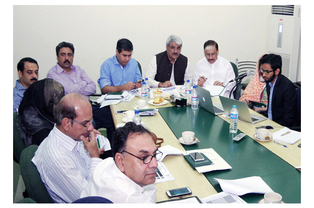 adviser to chief minister on health khawaja salman rafique presiding over a meeting of health edos photo nni