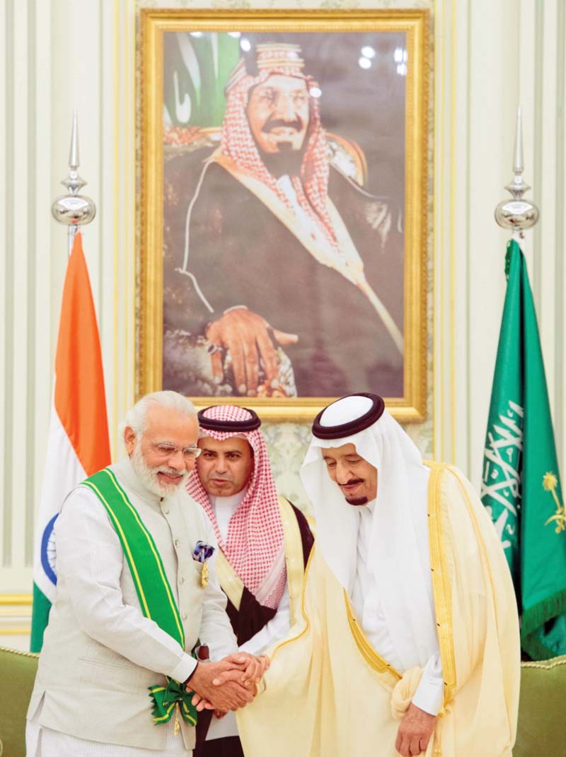 modi and king salman shake hands during a welcoming ceremony photo afp