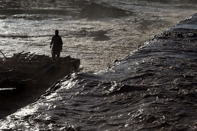 pakistani men stand over their vehicles submerged by flood water following heavy rain on the outskirts of peshawar on april 4 2016 at least 53 people were killed and 60 injured after heavy rain across northwest pakistan and areas of kashmir caused landslides and the roofs of dozens of homes to collapse officials said photo afp pakistani men stand over their vehicles submerged by flood water following heavy rain on the outskirts of peshawar on april 4 2016 at least 53 people were killed and 60 injured after heavy rain across northwest pakistan and areas of kashmir caused landslides and the roofs of dozens of homes to collapse officials said photo afp