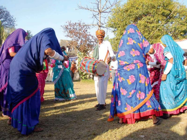 women perform a traditional sindhi dance at the lok mela photo express