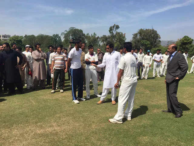 former pakistan cricket team captain imran khan giving fast bowling tips to young bowlers in islamabad on april 05 2016 photo express former pakistan cricket team captain imran khan giving fast bowling tips to young bowlers in islamabad on april 05 2016 photo express