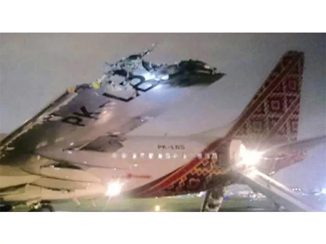 airplane with 49 passengers and seven crew on board was taking off when it clipped another aircraft across the runway photo jakarta police airplane with 49 passengers and seven crew on board was taking off when it clipped another aircraft across the runway photo jakarta police