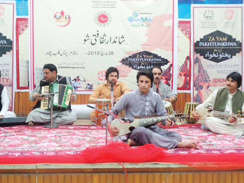a participant performs during a cultural show held in march photo express