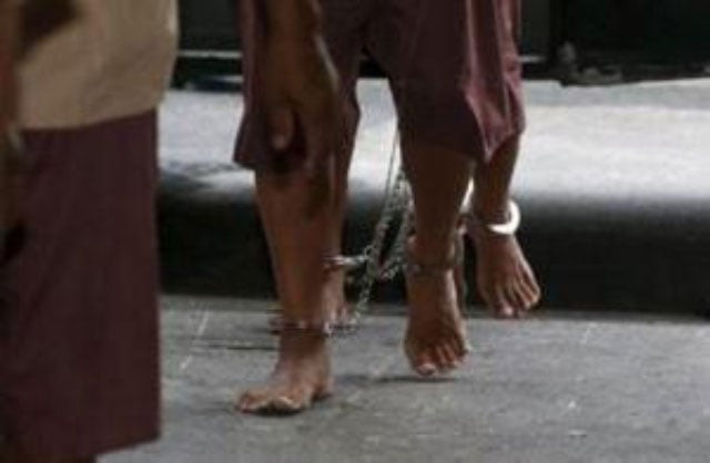 the shackled legs of suspected human traffickers are seen as they arrive for their trial at the criminal court in bangkok thailand in this file photo dated march 15 2016 photo reuters the shackled legs of suspected human traffickers are seen as they arrive for their trial at the criminal court in bangkok thailand in this file photo dated march 15 2016 photo reuters
