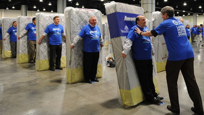 us electronics store sets largest human mattress dominoes record us electronics store sets largest human mattress dominoes record