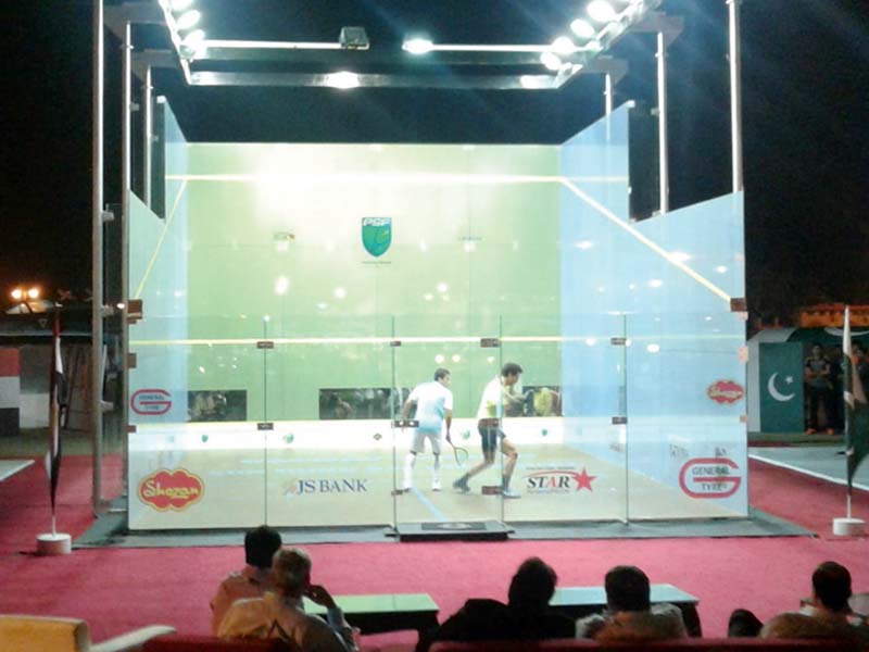 this file picture shows the legends v champions match under way between pakistan s asim khan and egypt s ali farag on the opening day of the event at the paf museum photo file