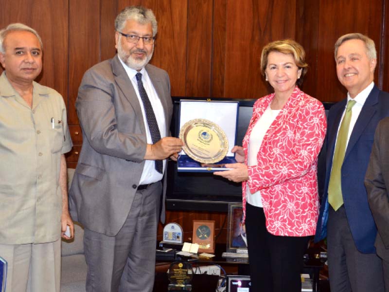 hec chairman dr mukhtar ahmed presents a souvenir to french ambassador martine dorance photo express