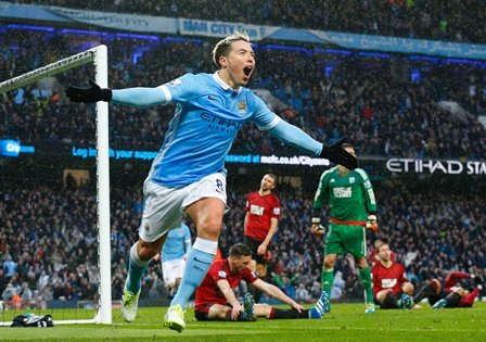samir nasri celebrates after scoring against west bromwich albion at the etihad stadium in manchester england on april 9 2016 photo afp