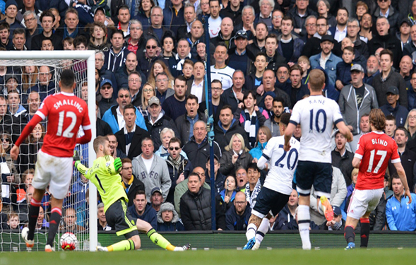 tottenham hotspur s english midfielder dele alli shoots and scores past manchester united s spanish goalkeeper david de gea during the english premier league football match between tottenham hotspur and manchester united at white hart lane in london on april 10 2016 photo afp