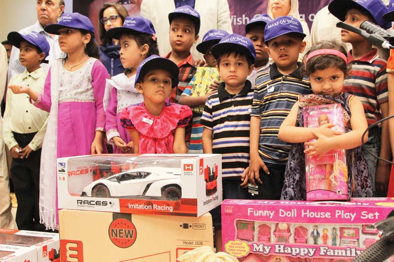 twenty five children suffering from different life threatening diseases were given gifts at a ceremony organised by make a wish foundation on saturday photo aysha saleem express