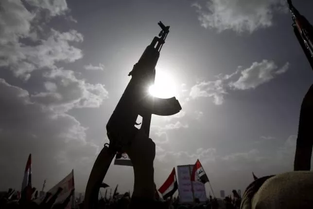a houthi follower rises a weapon as he attends a rally marking one year of saudi led air strikes in yemen 039 s capital sanaa march 26 2016 photo reuters a houthi follower rises a weapon as he attends a rally marking one year of saudi led air strikes in yemen 039 s capital sanaa march 26 2016 photo reuters