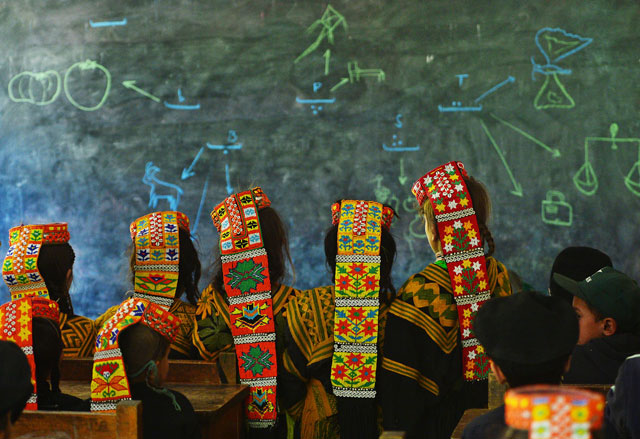 in this photograph taken on october 31 2015 kalash students attend a class at a school in the brun village of bumboret valley marriage for the kalash is not forever lovers need only to dance together then run away to be quot married quot just one of the many intangible parts of kalash culture that pakistan 039 s animistic tribe is fighting a sluggish bureaucracy to protect activists from the mountainous north have been working since 2008 to get the kalash on to unesco 039 s intangible cultural heritage list in a desperate bid to preserve the traditions of the ancient diminishing tribe photo afp