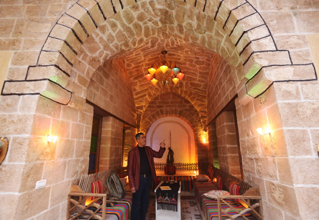 palestinian university professor atef salama stands at his house a 430 year old levantine style palace on february 6 2016 in gaza city the palace is among the rare vestiges of gaza city 039 s architectural heritage battered by war time population pressure and simple indifference photo afp