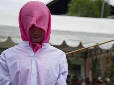 strict indonesian province canes non muslim for selling booze strict indonesian province canes non muslim for selling booze