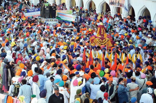 sikh devotees attend the baisakhi festival at gurdwara panja sahib in hassanabdal photo online file sikh devotees attend the baisakhi festival at gurdwara panja sahib in hassanabdal photo online file