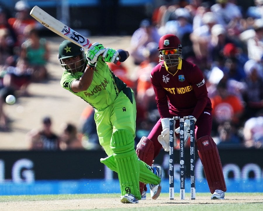 umar akmal playing a shot against west indies in world cup match in christchurch on february 21 2015 photo icc