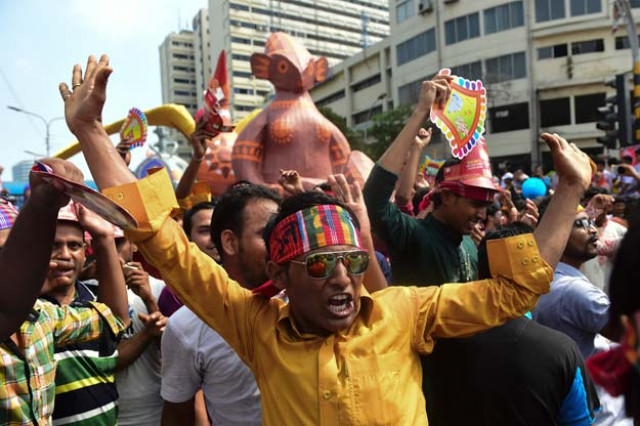 revellers attend a rally in celebration of the bengali new year or pohela boishakh in dhaka on april 14 2016 photo afp revellers attend a rally in celebration of the bengali new year or pohela boishakh in dhaka on april 14 2016 photo afp