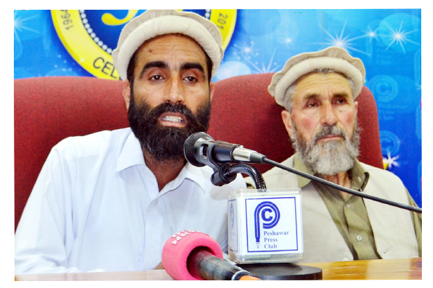 convener of united action consul upper dir and kohistan saeed gujjar addressing a press conference at peshawar press club photo inp