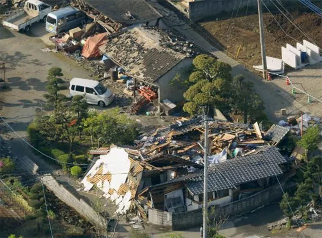 there was no tsunami warning but at least one person was killed after being crushed by a collapsing building photo reuters there was no tsunami warning but at least one person was killed after being crushed by a collapsing building photo reuters