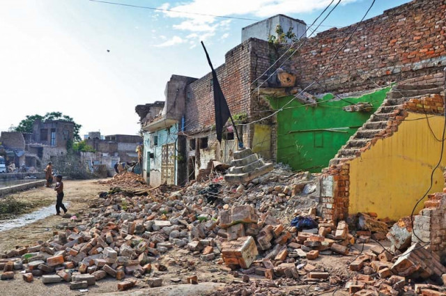 demolished structures in imamia colony photo express demolished structures in imamia colony photo express