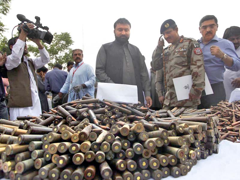 balochistan home minister sarfaraz bugti reviews the weapons recovered in an operation in quetta photo online